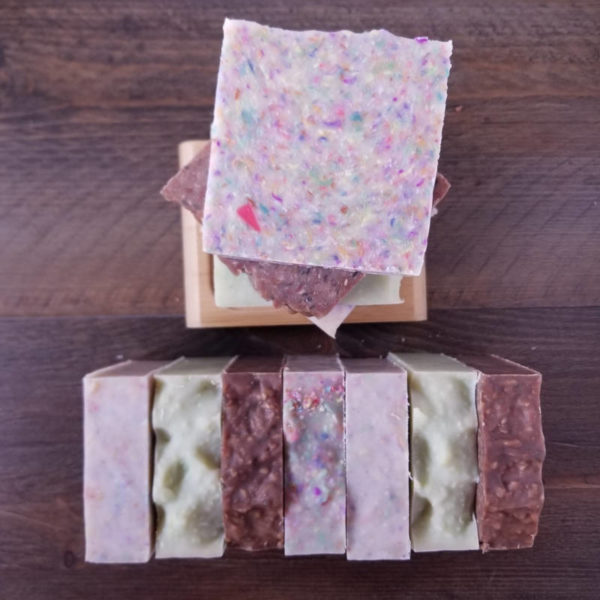 soap bars stacked on a wooden background