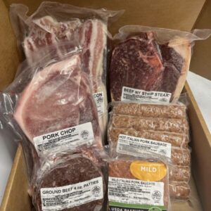 Box with frozen meat products including steak, burgers, and bacon.